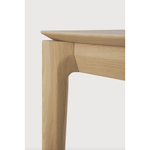 This Oak Bok Bench features an airy shape with rock-solid construction,  making this piece a timeless and remarkable design to enjoy for years to come. Pair with a dining table or stand-alone against a wall, hallway, or end of the bed!  Material: Oak Finish: Oiled