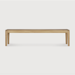 This Oak Bok Bench features an airy shape with rock-solid construction,  making this piece a timeless and remarkable design to enjoy for years to come. Pair with a dining table or stand-alone against a wall, hallway, or end of the bed!  Material: Oak Finish: Oiled
