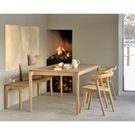 This Oak Bok Bench features an airy shape with rock-solid construction,  making this piece a timeless and remarkable design to enjoy for years to come. Pair with a dining table or stand-alone against a wall, hallway, or end of the bed!  Material: Oak Finish: Oiled