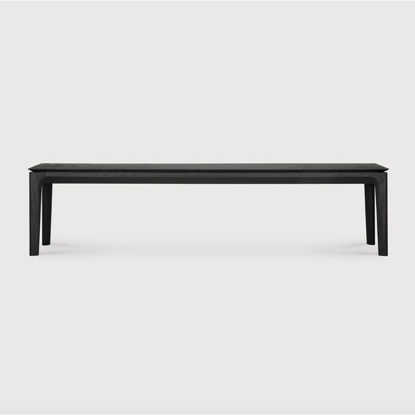 This Oak Bok Bench - Black features an airy shape with rock-solid construction,  making this piece a timeless and remarkable design to enjoy for years to come. Pair with a dining table or stand-alone against a wall, hallway, or end of the bed!  Material: Oak Finish: Oiled