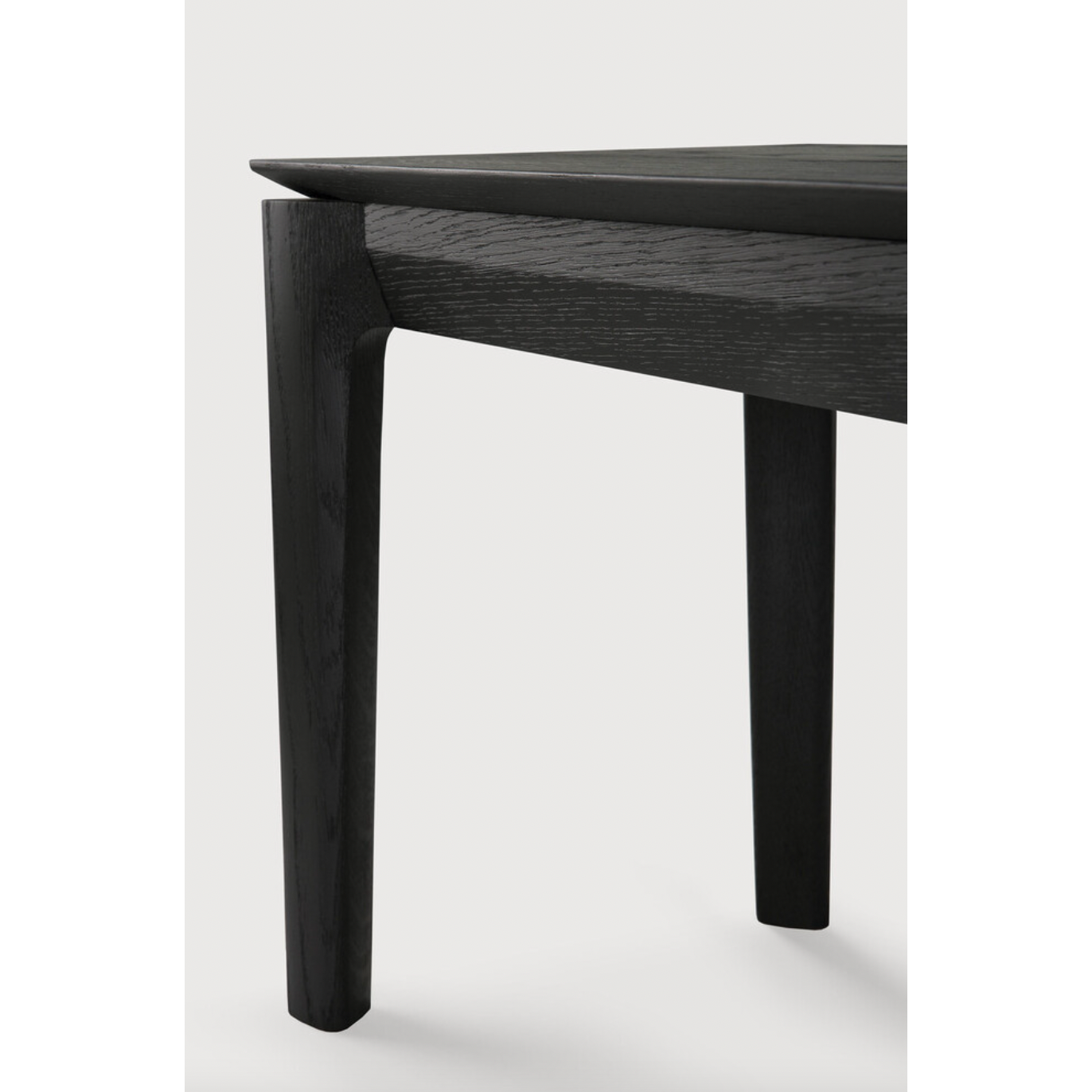 This Oak Bok Bench - Black features an airy shape with rock-solid construction,  making this piece a timeless and remarkable design to enjoy for years to come. Pair with a dining table or stand-alone against a wall, hallway, or end of the bed!  Material: Oak Finish: Oiled