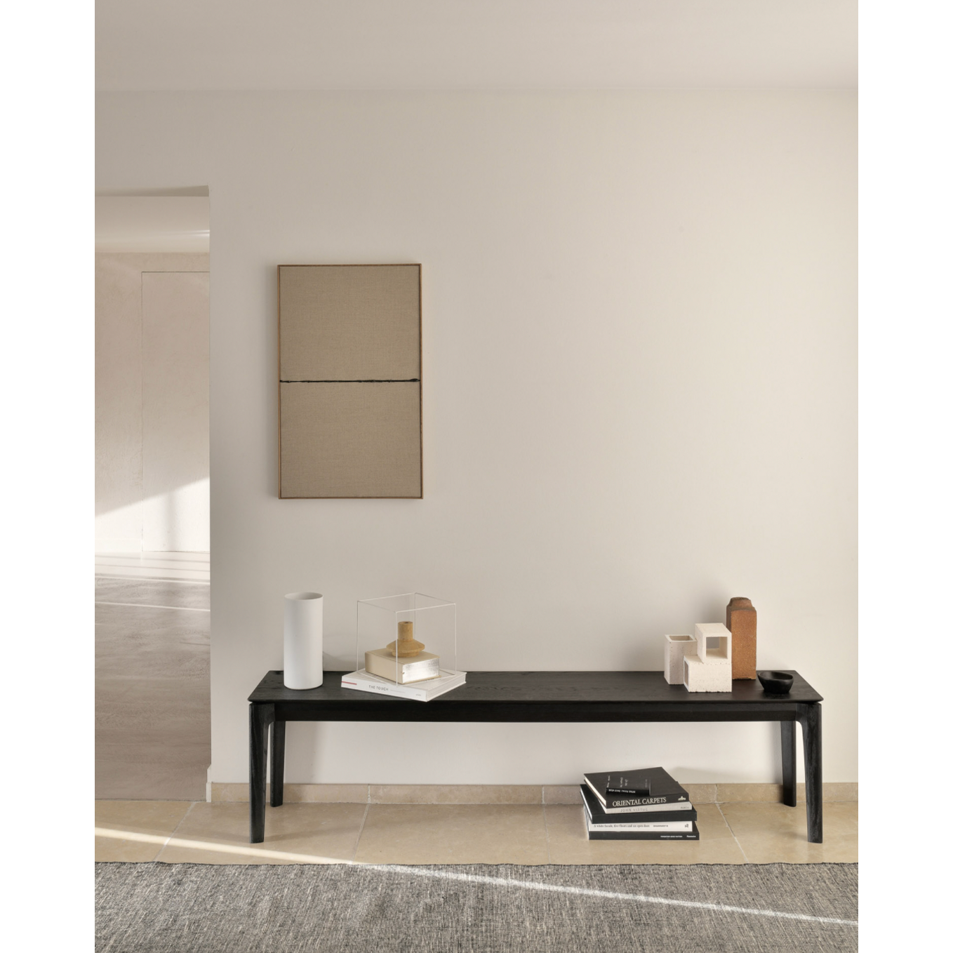 Featuring Oak Bok Bench - Black by Ethnicraft at Amethyst Home. This Oak Bok Bench - Black features an airy shape with rock-solid construction,  making this piece a timeless and remarkable design to enjoy for years to come. Pair with a dining table or stand-alone against a wall, hallway, or end of the bed! 
49.5" Dimensions: 50"w x 14"d x 18.5"h Weight: 31.  Amethyst Home provides interior design, new home construction design consulting, vintage area rugs, and lighting in the San Diego metro area.