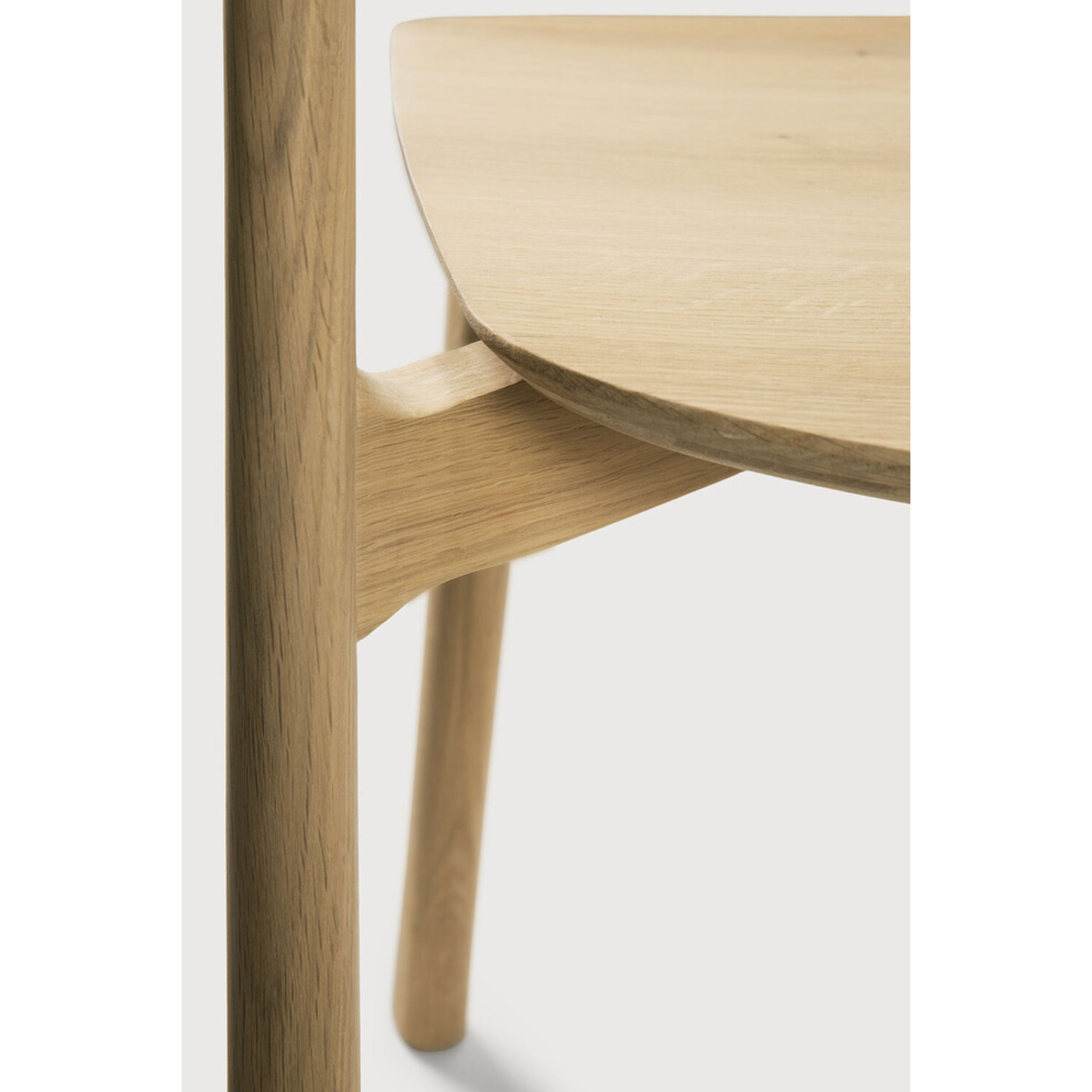 This Oak Bok Dining Chair features an airy shape with rock-solid construction,  making this piece a timeless and remarkable design to enjoy for years to come. Pair with a dining table or stand-alone against a wall, hallway, or end of the bed! Designed by Alain can Havre  Dimensions: 20"w x 21.5"d x 30"h  Weight: 20 lbs  Seat Height: 18"  Material: Oak, 100% solid wood Finish: Oiled