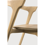 Featuring Oak Bok Dining Chair by Ethnicraft at Amethyst Home. This Oak Bok Dining Chair features an airy shape with rock-solid construction,  making this piece a timeless and remarkable design to enjoy for years to come. Pair with a dining table or stand-alone against a wall, hallway, or end of the bed! Designed by Alain can Havre
Dimensions: 20"w x 2.  Amethyst Home provides interior design, new home construction design consulting, vintage area rugs, and lighting in the Winter Garden metro area.