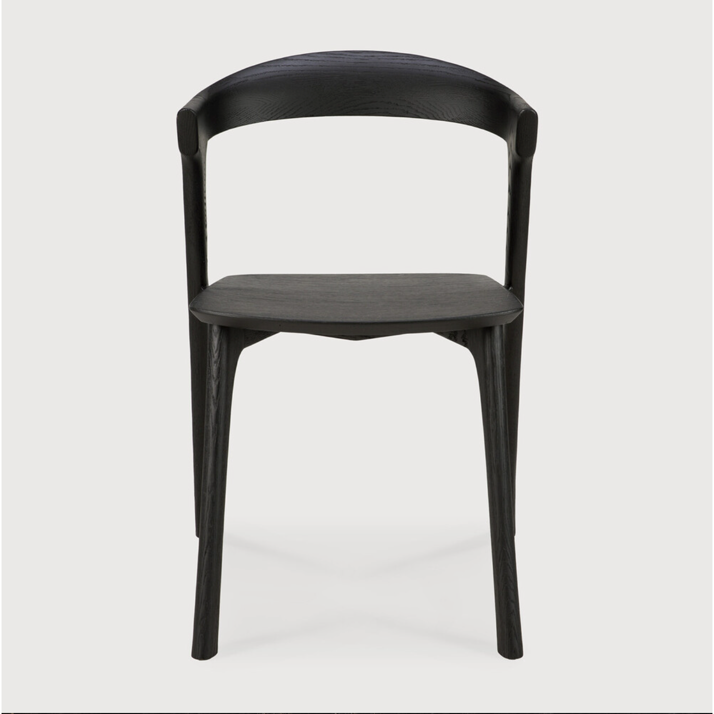 This Oak Bok Dining Chair features an airy shape with rock-solid construction,  making this piece a timeless and remarkable design to enjoy for years to come. Pair with a dining table or stand-alone against a wall, hallway, or end of the bed! Designed by Alain can Havre  Dimensions: 20"w x 21.5"d x 30"h  Weight: 15 lbs  Seat Height: 18" Seat Height with Upholstery: 19"  Material: Oak, 100% solid wood Finish: Varnished