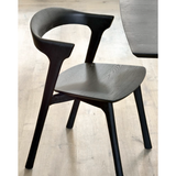 Featuring Oak Bok Dining Chair - Black by Ethnicraft at Amethyst Home. This Oak Bok Dining Chair features an airy shape with rock-solid construction,  making this piece a timeless and remarkable design to enjoy for years to come. Pair with a dining table or stand-alone against a wall, hallway, or end of the bed! Designed by Alain can Havre
Dimensions: 20"w x 2.  Amethyst Home provides interior design, new home construction design consulting, vintage area rugs, and lighting in the Miami metro area.