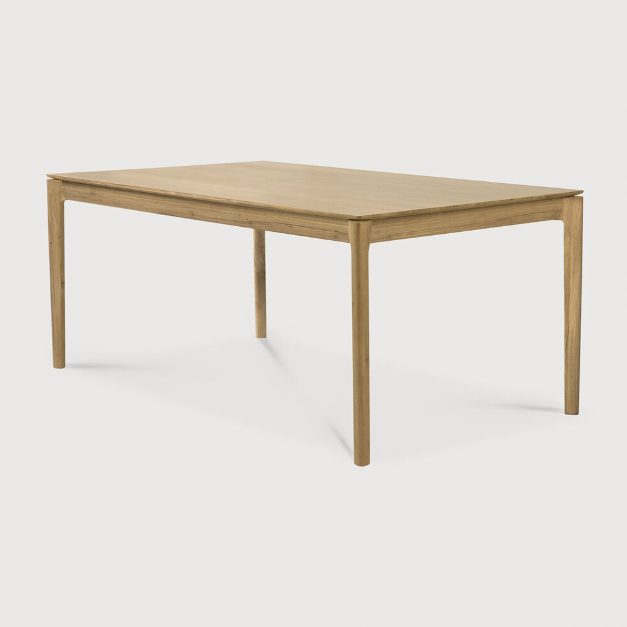 The airy shape yet rock solid construction make this Oak Bok Dining Table a timeless and remarkable design to enjoy for years to come. Available in many sizes, this can fit any dining room or kitchen area.   Material: Oak, 100% Solid Wood Finish: Oiled