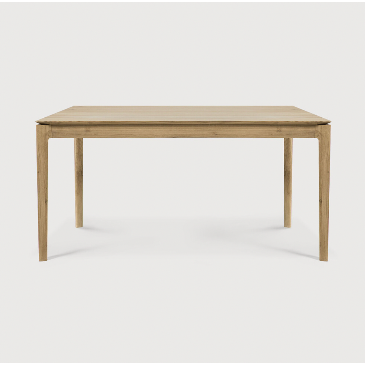 The airy shape yet rock solid construction make this Oak Bok Dining Table a timeless and remarkable design to enjoy for years to come. Available in many sizes, this can fit any dining room or kitchen area.   Material: Oak, 100% Solid Wood Finish: Oiled