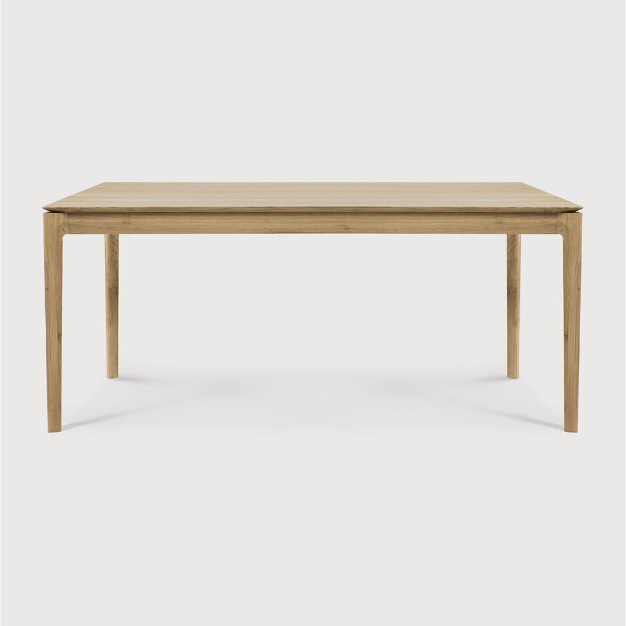 The airy shape yet rock solid construction make this Oak Bok Dining Table a timeless and remarkable design to enjoy for years to come. Available in many sizes, this can fit any dining room or kitchen area.   Material: Oak, 100% Solid Wood Finish: Oiled