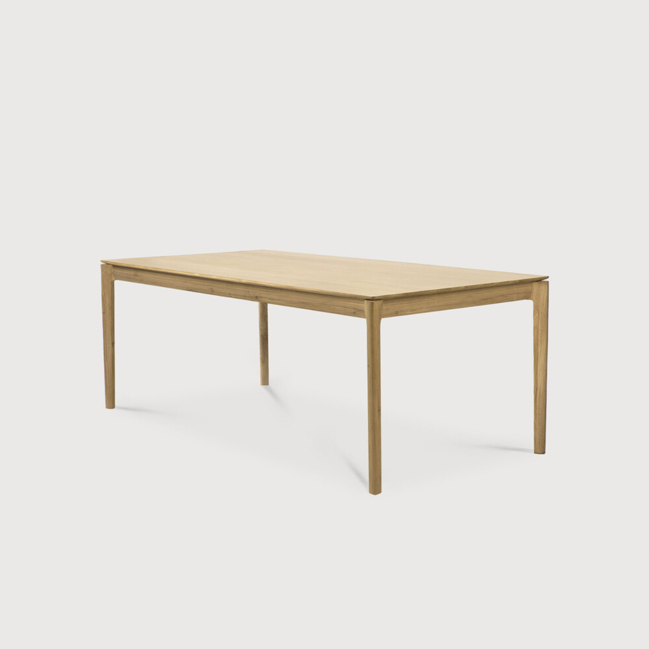 This Oak Bok Extendable Dining Table is perfect for families who want extra space when their kids, extended family, or guests come to celebrate! Its airy shape yet rock solid construction make this piece a timeless and remarkable design to enjoy for years to come.  Material: Oak, 100% Solid Wood Finish: Oiled