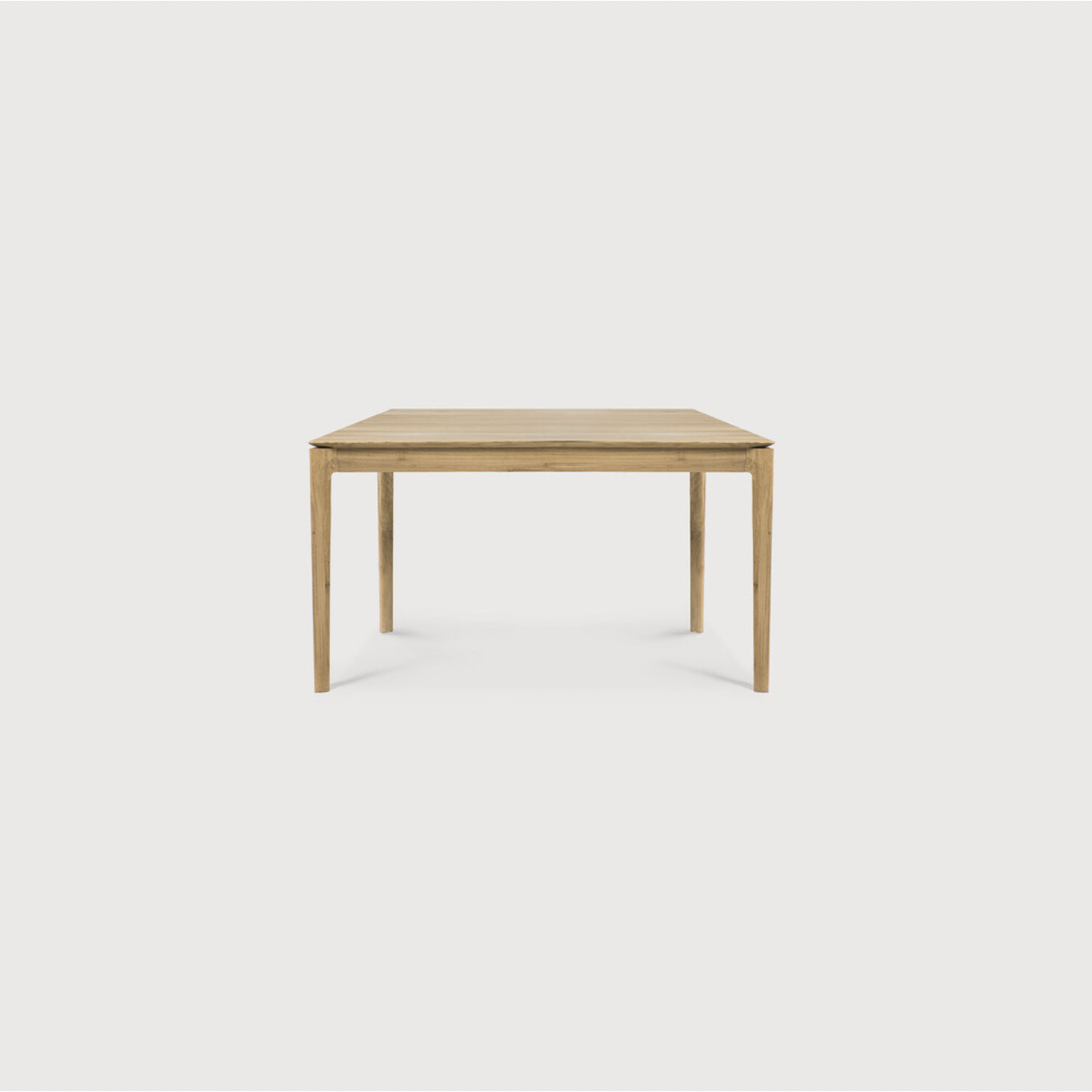 This Oak Bok Extendable Dining Table is perfect for families who want extra space when their kids, extended family, or guests come to celebrate! Its airy shape yet rock solid construction make this piece a timeless and remarkable design to enjoy for years to come.  Material: Oak, 100% Solid Wood Finish: Oiled
