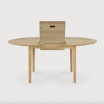 This Oak Bok Round Extendable Dining Table offers the perfect solution for adaptable dining within a smaller space. The iconic airy shape and solid construction make for a timeless design to enjoy for years to come.  Material: Oak, 100% Solid Wood Finish: Oiled