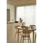 This Oak Bok Round Extendable Dining Table offers the perfect solution for adaptable dining within a smaller space. The iconic airy shape and solid construction make for a timeless design to enjoy for years to come.  Material: Oak, 100% Solid Wood Finish: Oiled