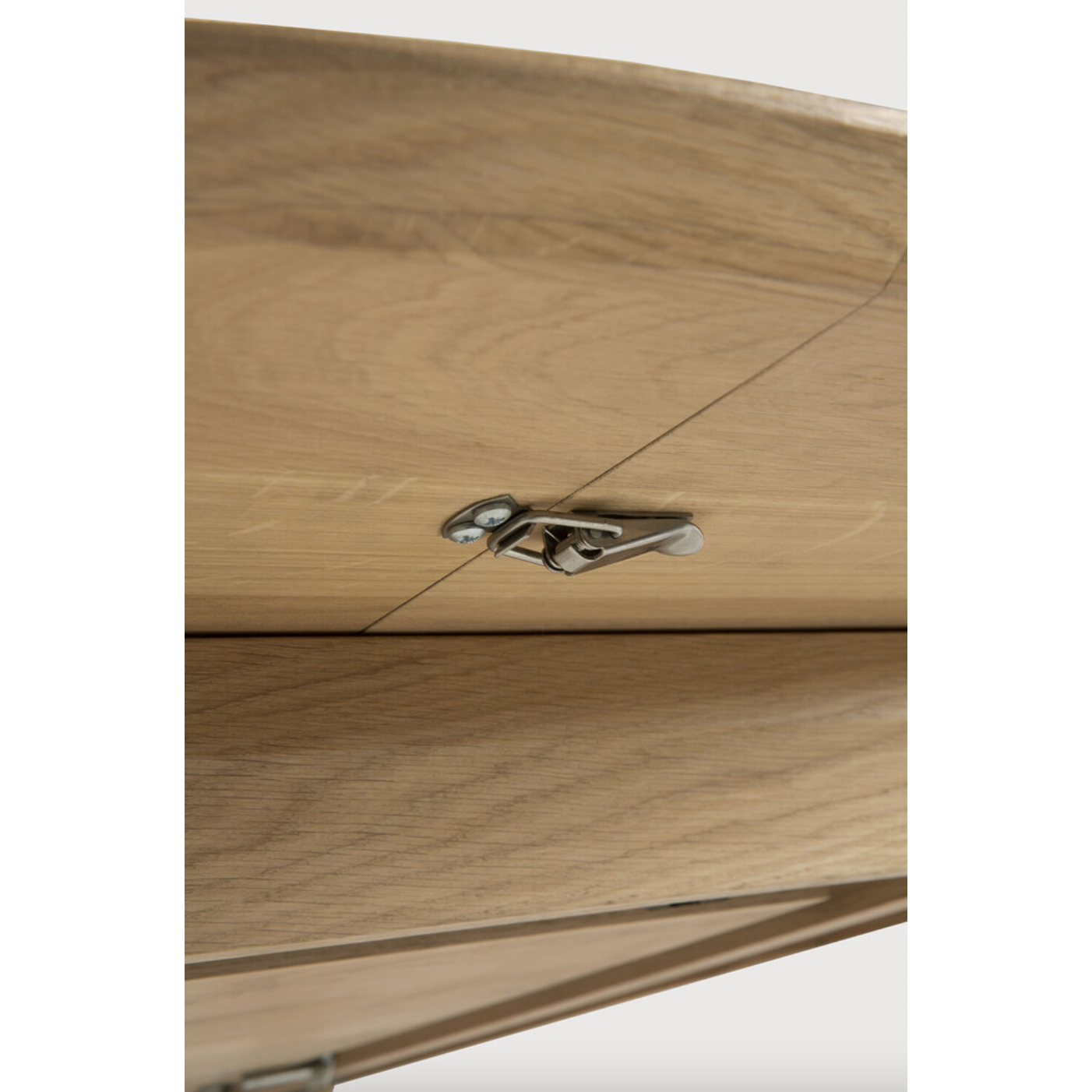 This Oak Bok Round Extendable Dining Table offers the perfect solution for adaptable dining within a smaller space. The iconic airy shape and solid construction make for a timeless design to enjoy for years to come.  Material: Oak, 100% Solid Wood Finish: Oiled