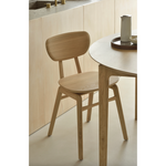 This Oak Bok Round Extendable Dining Table offers the perfect solution for adaptable dining within a smaller space. The iconic airy shape and solid construction make for a timeless design to enjoy for years to come.  Material: Oak, 100% Solid Wood Finish: Oiled