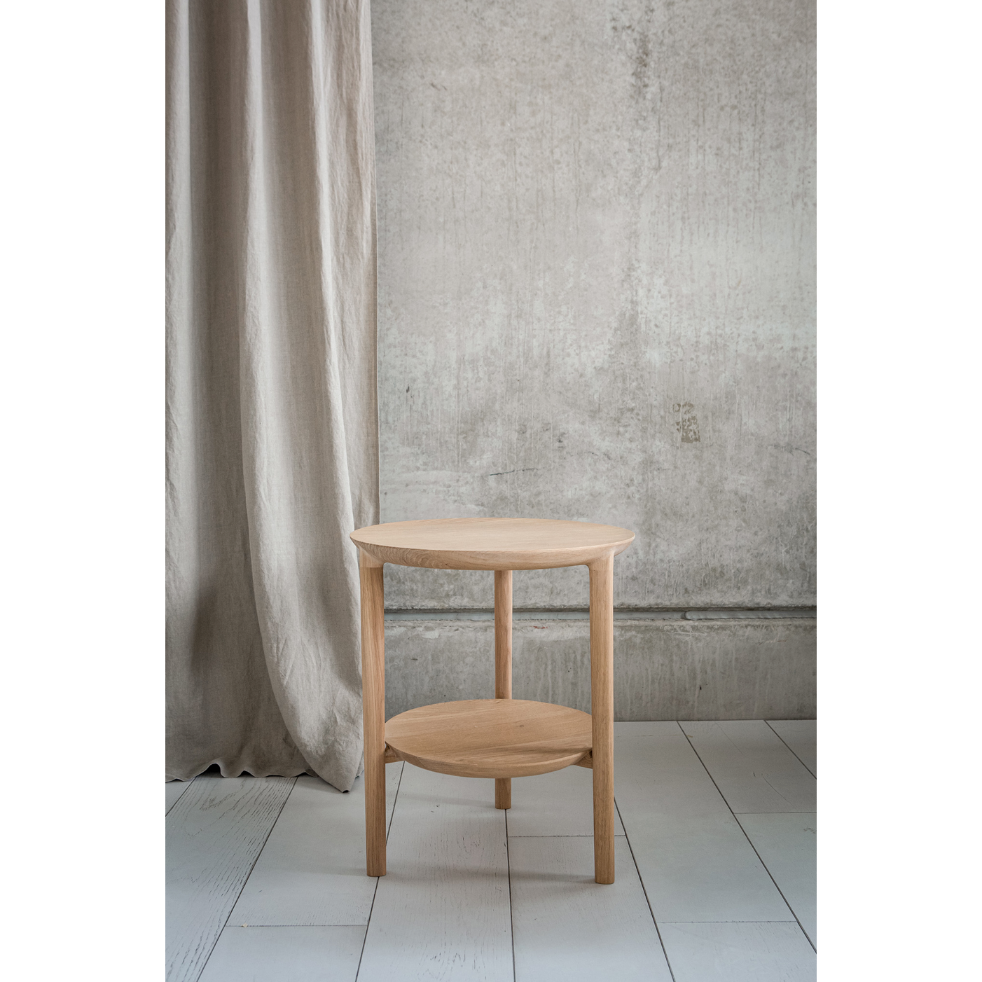 We love the sleek, timeless shape of the Oak Bok Side Table as it makes a beautiful addition to any lounge space. From art to books or plants, with the Bok side table, your object of choice has found its stage.  Dimensions: 17"w x 17"d x 20"h  Weight: 13 lbs  Material: Oak, 100% solid wood Finish: Varnished
