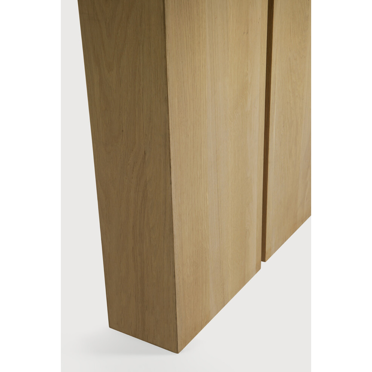 We love the solid look and pure lines of this Oak Double Extendable Dining Table.   Although the table looks heavy, it can very easily be extended single-handedly. It takes a few steps and no more than seconds to make space for whatever will be happening next in your home!  Material: Oak, 100% Solid Wood Finish: Oak  