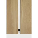 We love the solid look and pure lines of this Oak Double Extendable Dining Table.   Although the table looks heavy, it can very easily be extended single-handedly. It takes a few steps and no more than seconds to make space for whatever will be happening next in your home!  Material: Oak, 100% Solid Wood Finish: Oak  