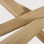 This Oak Mikado Dining Table - Oval by Alain Van Havre is all about inspiring your family to spend a little more time at the table. We love that the solid legs intertwine in perfect balance to elevate the look to any dining room or kitchen area.   Material: Oak, 100% Solid Wood Finish: Oiled
