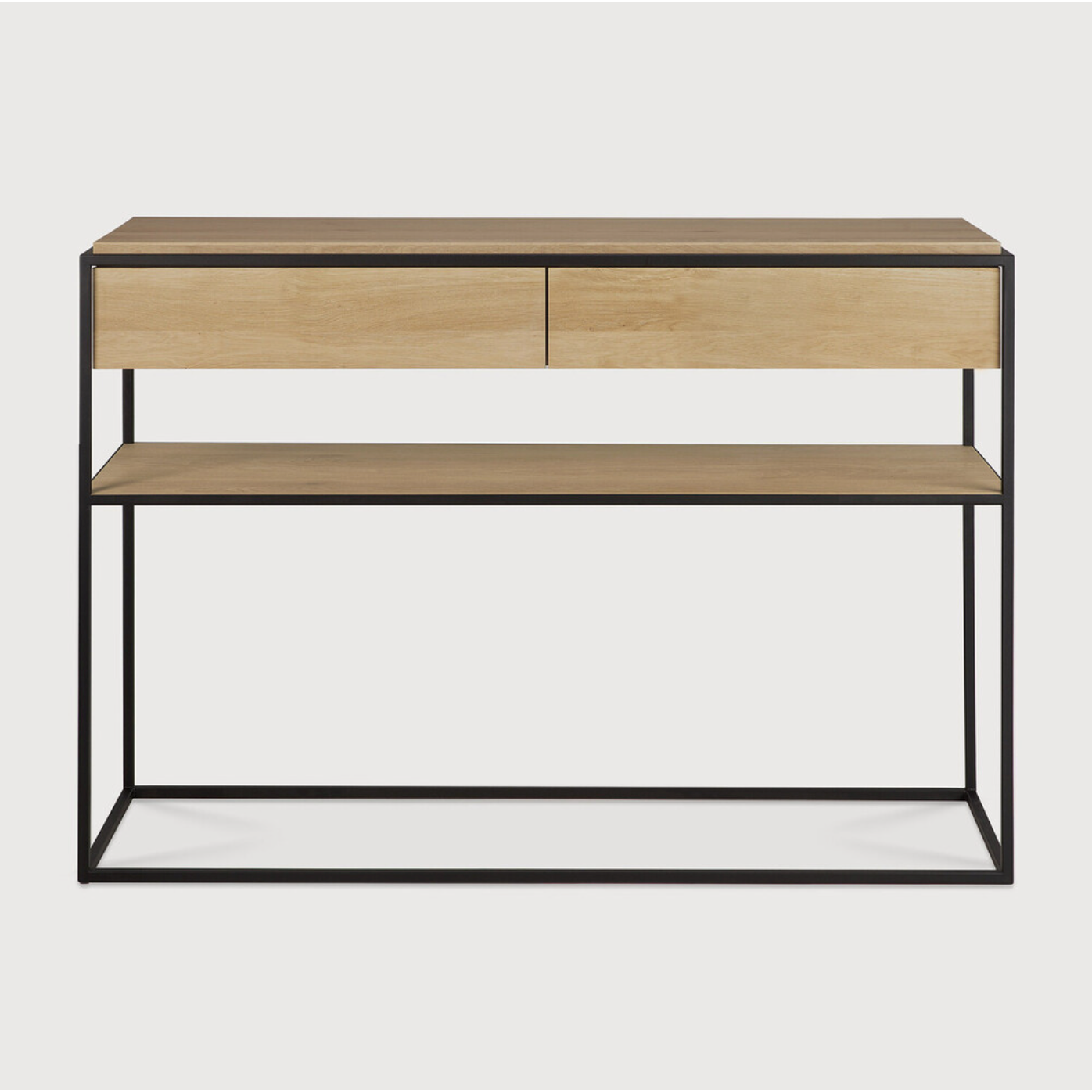 Balance and function come together in the Monolit console table. This simple, sleek table includes storage and we LOVE hidden storage! Dress up your living room or office with a piece that is both functional and stylish!  Dimensions: 48.5"w x 16"d x 33.5"h  Weight: 77 lbs  Material: Oak, 100% solid wood Finish: Oiled