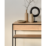 Featuring Oak Monolit Console Table by Ethnicraft at Amethyst Home. Balance and function come together in the Monolit console table. This simple, sleek table includes storage and we LOVE hidden storage! Dress up your living room or office with a piece that is both functional and stylish!
Dimensions: 48.5"w x 16"d x 33.5"h Weight: 77 lbs
Material: Oak, 100% so.  Amethyst Home provides interior design, new home construction design consulting, vintage area rugs, and lighting in the Dallas metro area.