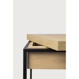 Balance and function come together in the Monolit side table. This simple, sleek table includes storage and we LOVE hidden storage! Dress up your living room or office with a piece that is both functional and stylish!  Dimensions: 19"w x 19"d x 20.5"h  Weight: 22 lbs  Material: Oak, 100% solid wood Finish: Oiled