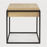 Featuring Oak Monolit Side Table by Ethnicraft at Amethyst Home. Balance and function come together in the Monolit side table. This simple, sleek table includes storage and we LOVE hidden storage! Dress up your living room or office with a piece that is both functional and stylish!
Dimensions: 19"w x 19"d x 20.5"h Weight: 22 lbs
Material: Oak, 100% solid woo.  Amethyst Home provides interior design, new home construction design consulting, vintage area rugs, and lighting in the Seattle metro area.