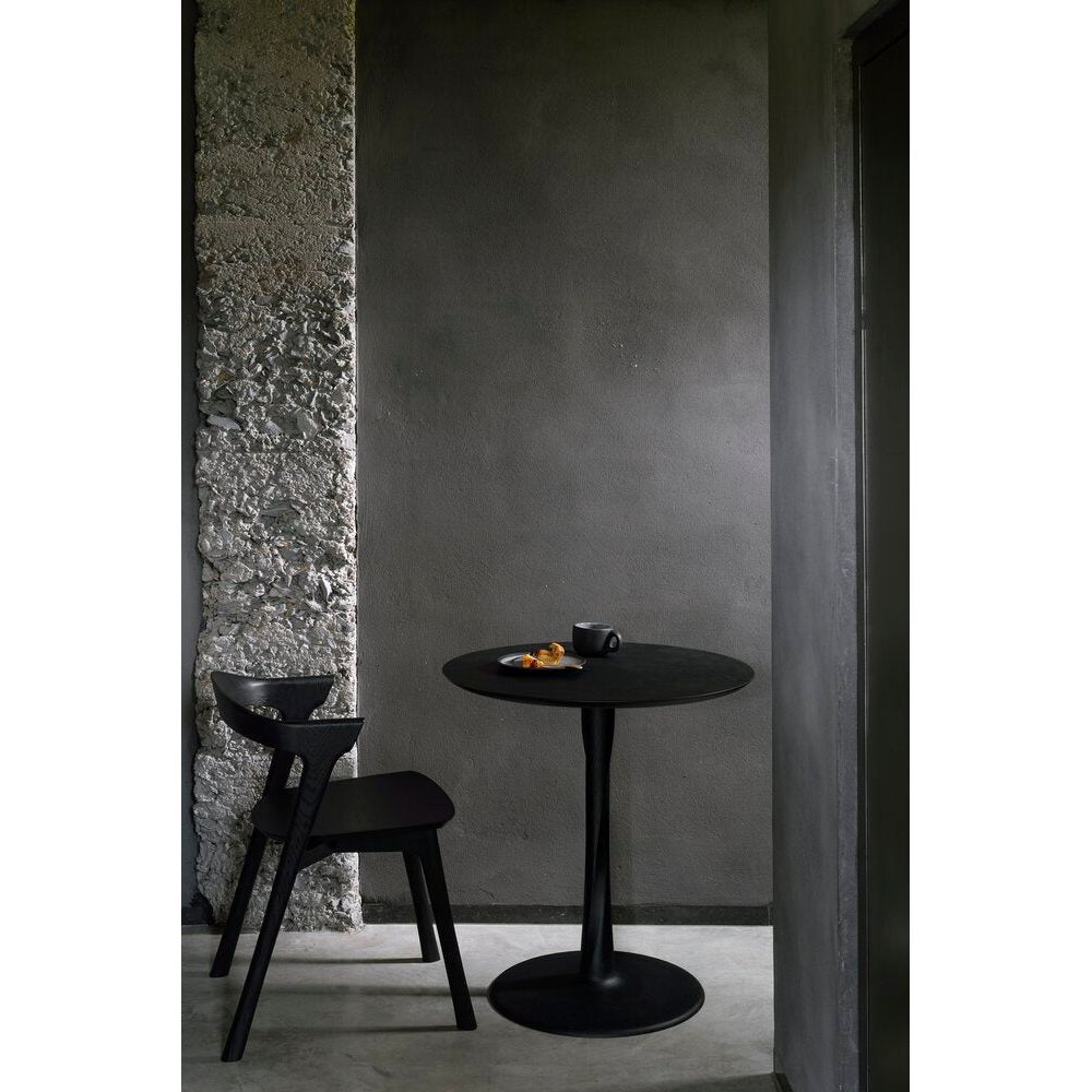 Featuring Oak Round Torsion Dining Table - Black by Ethnicraft at Amethyst Home. We love the modern, sleek look of this Oak Torsion Dining Table - Black. The varnish finish gives more depth, with the rougher surface highlighting the grain of the wood.
Dimensions 28": 28"w x 28"d x 30"h Weight: 46 lbs
Dimensions 35.5": 35.5"w x 25.5" x 30"hWeight: 73 lbs
Dimen.  Amethyst Home provides interior design, new home construction design consulting, vintage area rugs, and lighting in the Boston metro area.