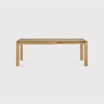 Featuring Oak Slice Extendable Dining Table by Ethnicraft at Amethyst Home. This Oak Slice Extendable Dining Table bevelled edges give it a unique character, but there's also a little extra added. This table can easily be extended without interruption of the wood grain pattern -- perfect for gathering your family or friends for hosting parties or the holidays.  Amethyst Home provides interior design, new home construction design consulting, vintage area rugs, and lighting in the Boston metro area.