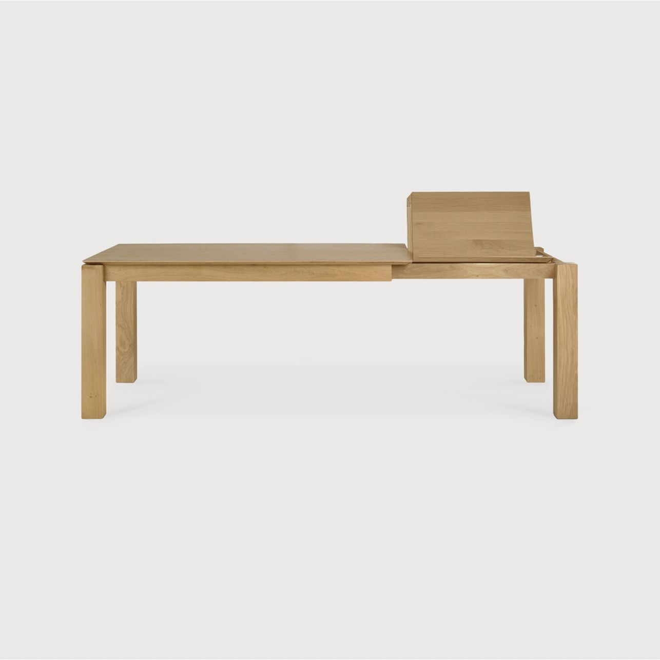 Featuring Oak Slice Extendable Dining Table by Ethnicraft at Amethyst Home. This Oak Slice Extendable Dining Table bevelled edges give it a unique character, but there's also a little extra added. This table can easily be extended without interruption of the wood grain pattern -- perfect for gathering your family or friends for hosting parties or the h.  Amethyst Home provides interior design, new home construction design consulting, vintage area rugs, and lighting in the Winter Garden metro area.