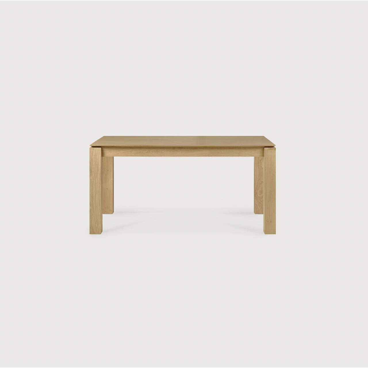 Featuring Oak Slice Extendable Dining Table by Ethnicraft at Amethyst Home. This Oak Slice Extendable Dining Table bevelled edges give it a unique character, but there's also a little extra added. This table can easily be extended without interruption of the wood grain pattern -- perfect for gathering your family or friends for hosting parties or the holid.  Amethyst Home provides interior design, new home construction design consulting, vintage area rugs, and lighting in the San Diego metro area.