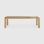 Featuring Oak Slice Extendable Dining Table by Ethnicraft at Amethyst Home. This Oak Slice Extendable Dining Table bevelled edges give it a unique character, but there's also a little extra added. This table can easily be extended without interruption of the wood grain pattern -- perfect for gathering your family or friends for hosting parties or the holi.  Amethyst Home provides interior design, new home construction design consulting, vintage area rugs, and lighting in the Scottsdale metro area.