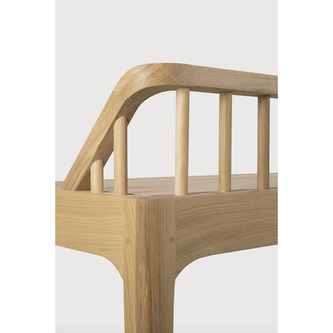 Wherever you choose to place it, this Oak Spindle Bench in solid oak is a striking piece. We'd love to see this styled with an Amethyst Pillow in your entryway, bedroom, or other space!   Dimensions: 59.5"w x 14"d x 24"h  Seat Height: 18" Weight: 28 lbs  Material: Oak, 100% Solid Wood Finish: Oiled