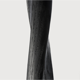 Featuring Oak Round Torsion Dining Table - Black by Ethnicraft at Amethyst Home. We love the modern, sleek look of this Oak Torsion Dining Table - Black. The varnish finish gives more depth, with the rougher surface highlighting the grain of the wood.
Dimensions 28": 28"w x 28"d x 30"h Weight: 46 lbs
Dimensions 35.5": 35.5"w x 25.5" x 30"hWeight: 73 lbs
D.  Amethyst Home provides interior design, new home construction design consulting, vintage area rugs, and lighting in the Alpharetta metro area.