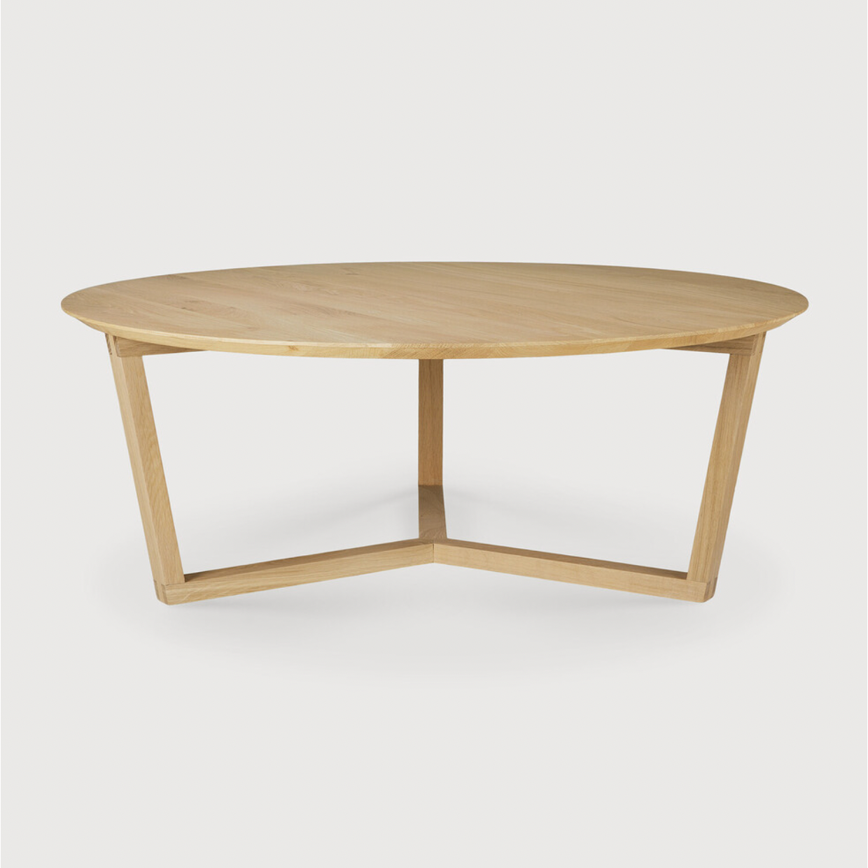 Made of solid wood, this Oak Tripod Coffee Table is characterized by clean lines and contemporary aesthetics. We love the bright, coastal feel it brings to any living room or lounge area!  Dimensions: 38"w x 38"d x 14.5"h  Weight: 29 lbs  Material: Oak, 100% Solid Wood Finish: Varnished