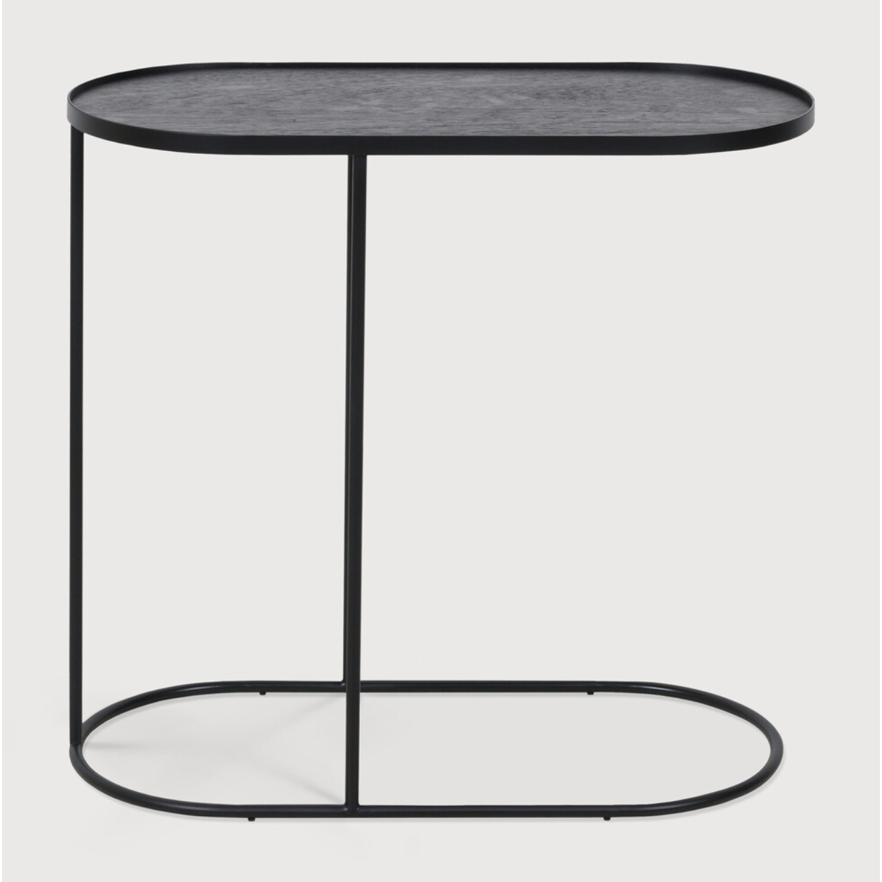 We love that this Oblong Tray Side Table has the ability to adopt different trays to mix or match various colors and patterns, creating a personal piece that is uniquely yours!  Dimensions: 27.5"w x 13"d x 26"h   Material: Metal 
