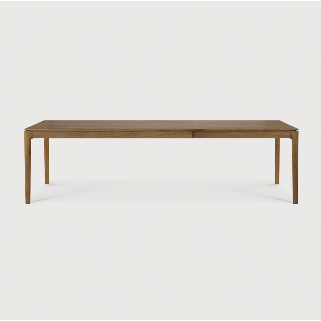 This Oak Bok Extendable Dining Table is perfect for families who want extra space when their kids, extended family, or guests come to celebrate! Its airy shape yet rock solid construction make this piece a timeless and remarkable design to enjoy for years to come.  Material: Oak, 100% Solid Wood Finish: Oiled