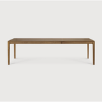 This Oak Bok Extendable Dining Table is perfect for families who want extra space when their kids, extended family, or guests come to celebrate! Its airy shape yet rock solid construction make this piece a timeless and remarkable design to enjoy for years to come.  Material: Oak, 100% Solid Wood Finish: Oiled