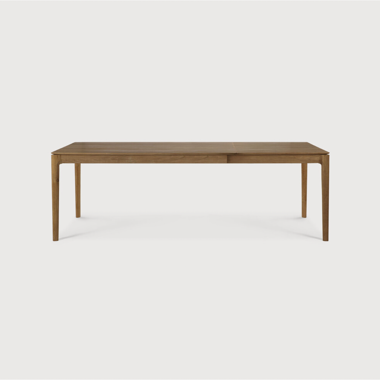 This Oak Bok Extendable Dining Table is perfect for families who want extra space when their kids, extended family, or guests come to celebrate! Its airy shape yet rock solid construction make this piece a timeless and remarkable design to enjoy for years to come.  Material: Oak, 100% Solid Wood Finish: Oiled