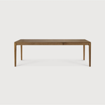 This Oak Bok Extendable Dining Table is perfect for families who want extra space when their kids, extended family, or guests come to celebrate! Its airy shape yet rock solid construction make this piece a timeless and remarkable design to enjoy for years to come.  Material: Oak, 100% Solid Wood Finish: Oiled