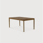 This Oak Bok Extendable Dining Table is perfect for families who want extra space when their kids, extended family, or guests come to celebrate! Its airy shape yet rock solid construction make this piece a timeless and remarkable design to enjoy for years to come.  Material: Oak, 100% Solid Wood Finish: Oiled