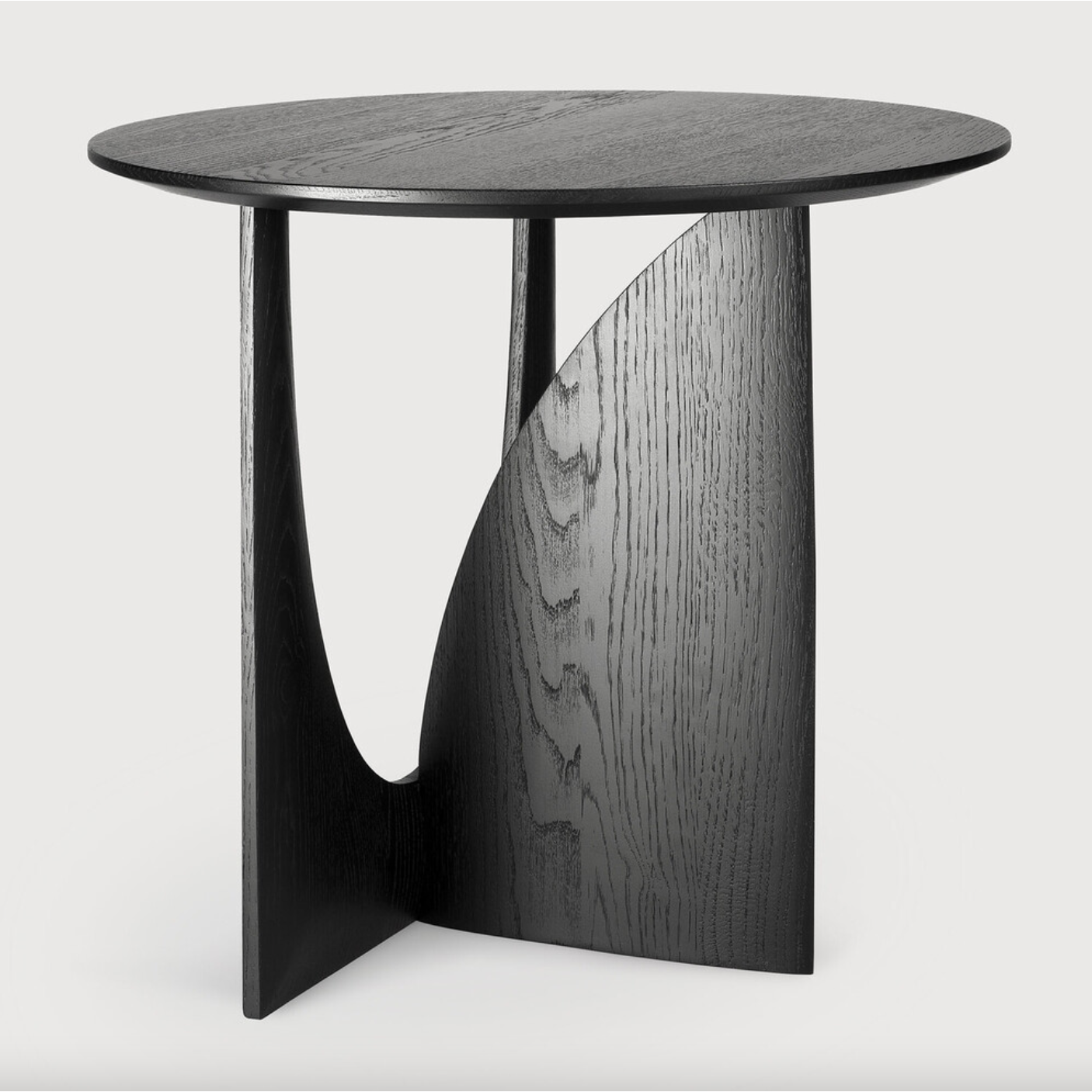 From any angle, the Oak Geometric Side Table does not only look different, it also becomes different. We love seeing this table as a sculptural accent to your living space or office.  Designed by Alain van Havre  Dimensions: 20.5"w x 20.5"d x 20"h  Weight: 11 lbs  Material: Oak Finish: Varnished