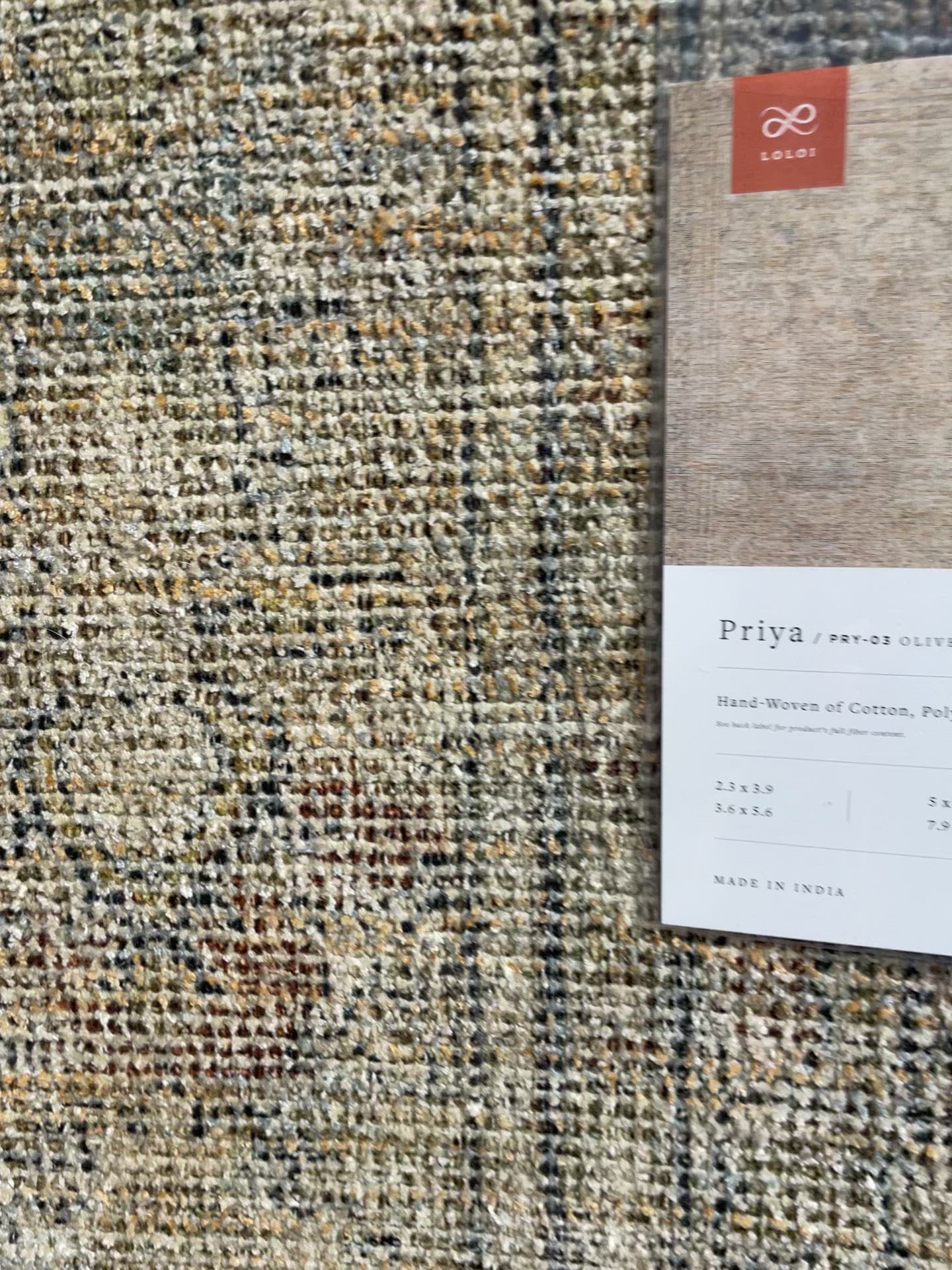 Load video: Priya Olive / Graphite Rug