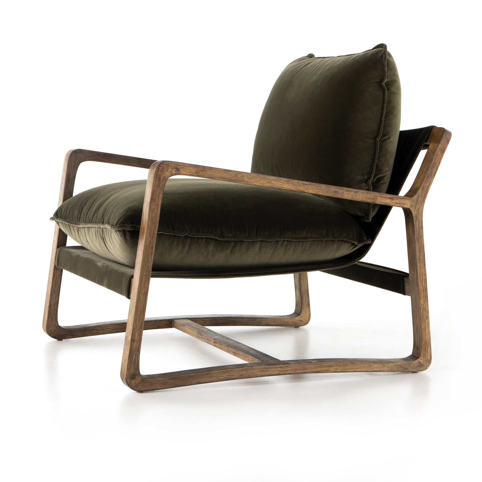 This Ace Chair in Olive Green has a comfortable, cushy seat for the perfect place to curl up with a good book. A hand-shaped oak frame supports deep, low-style seating covered in soft, olive-colored cotton - sure to elevate the look of any living room or office. Amethyst Home provides interior design, new home construction design consulting, vintage area rugs, and lighting in the Washington metro area.