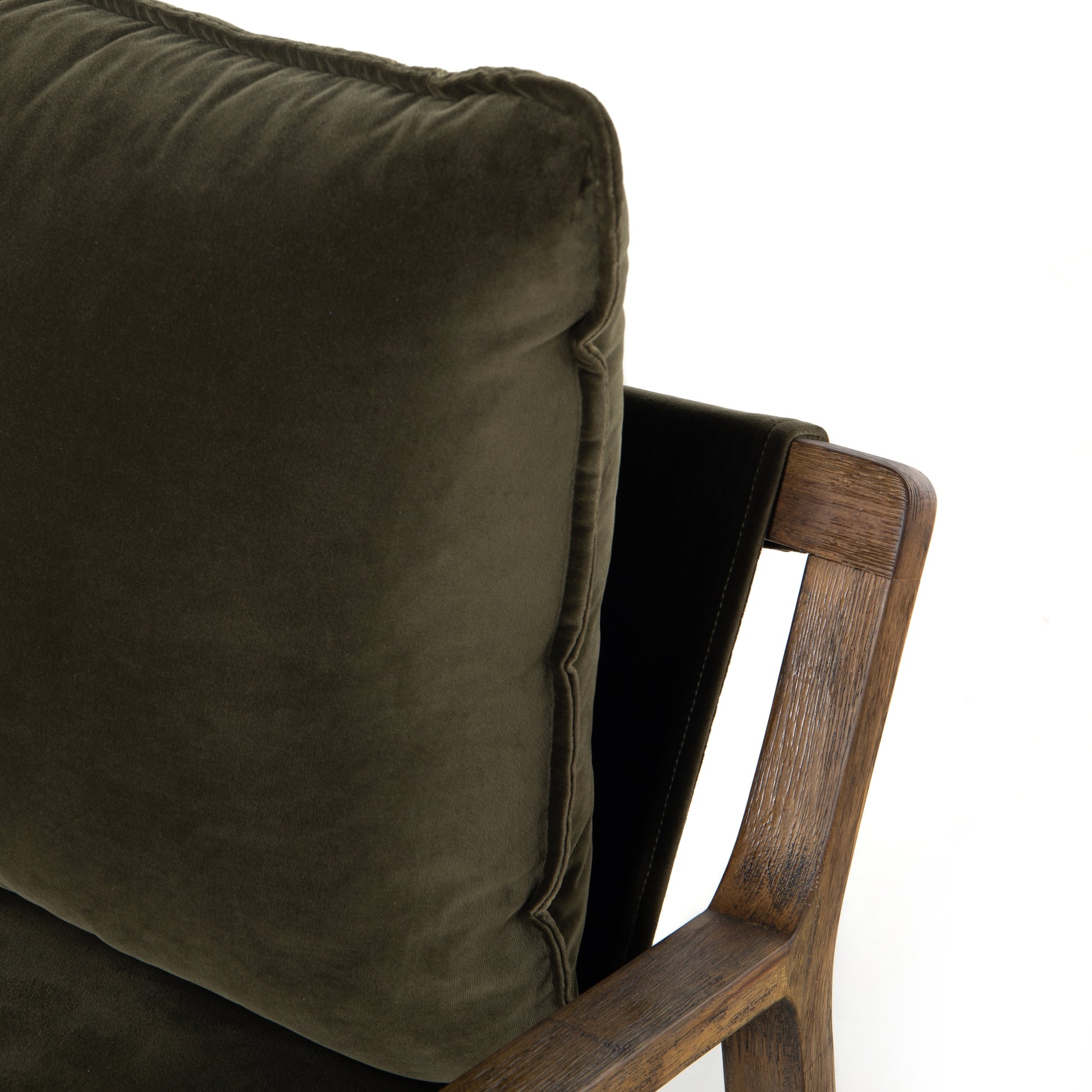 This Ace Chair in Olive Green has a comfortable, cushy seat for the perfect place to curl up with a good book. A hand-shaped oak frame supports deep, low-style seating covered in soft, olive-colored cotton - sure to elevate the look of any living room or office. Amethyst Home provides interior design, new home construction design consulting, vintage area rugs, and lighting in the Laguna Beach metro area.