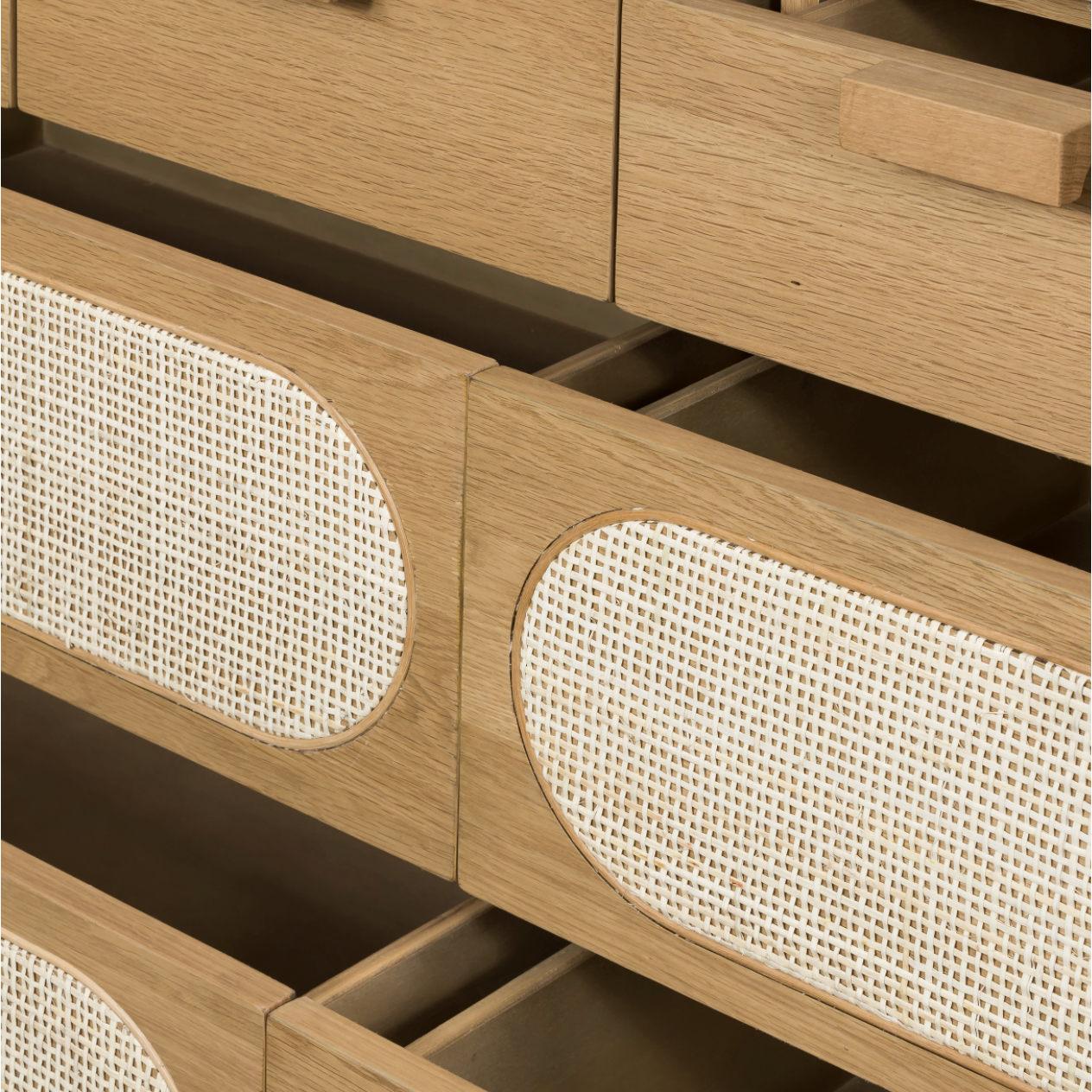This Allegra 8 Drawer Dresser - Natural Cane is made of a gorgeous, honey-finished oak. With eight spacious drawers and wood-backed cane paneling, the soft, neutral look brings to life to any bedroom.   Overall Dimensions: 61.00"w x 18.00"d x 33.00"h