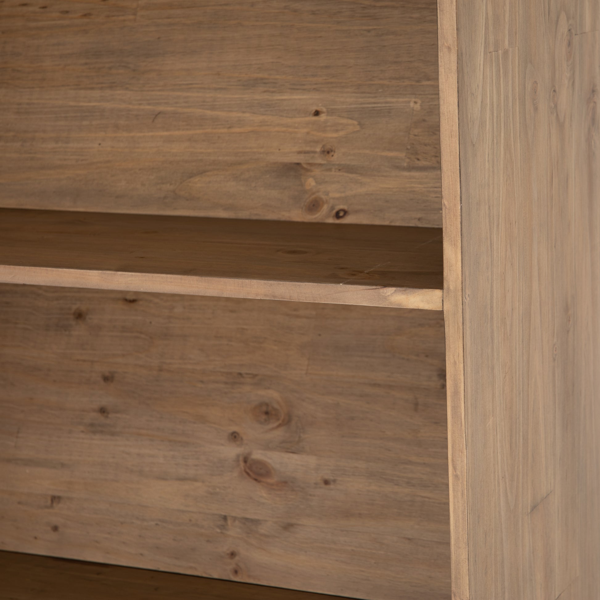 Five roomy shelves are ready to store favorite books and treasures, with smoked solid pine suited for any space. Removable ledges slant at an angle on each shelf, for even-better display of art and coffee table-size books, plus an optional slide ladder (for decorative use only) to complete the look.  Overall Dimensions: 35.50"w x 17.50"d x 98"h Colors: Smoked Pine, Black Iron Materials: Solid Pine, Iron