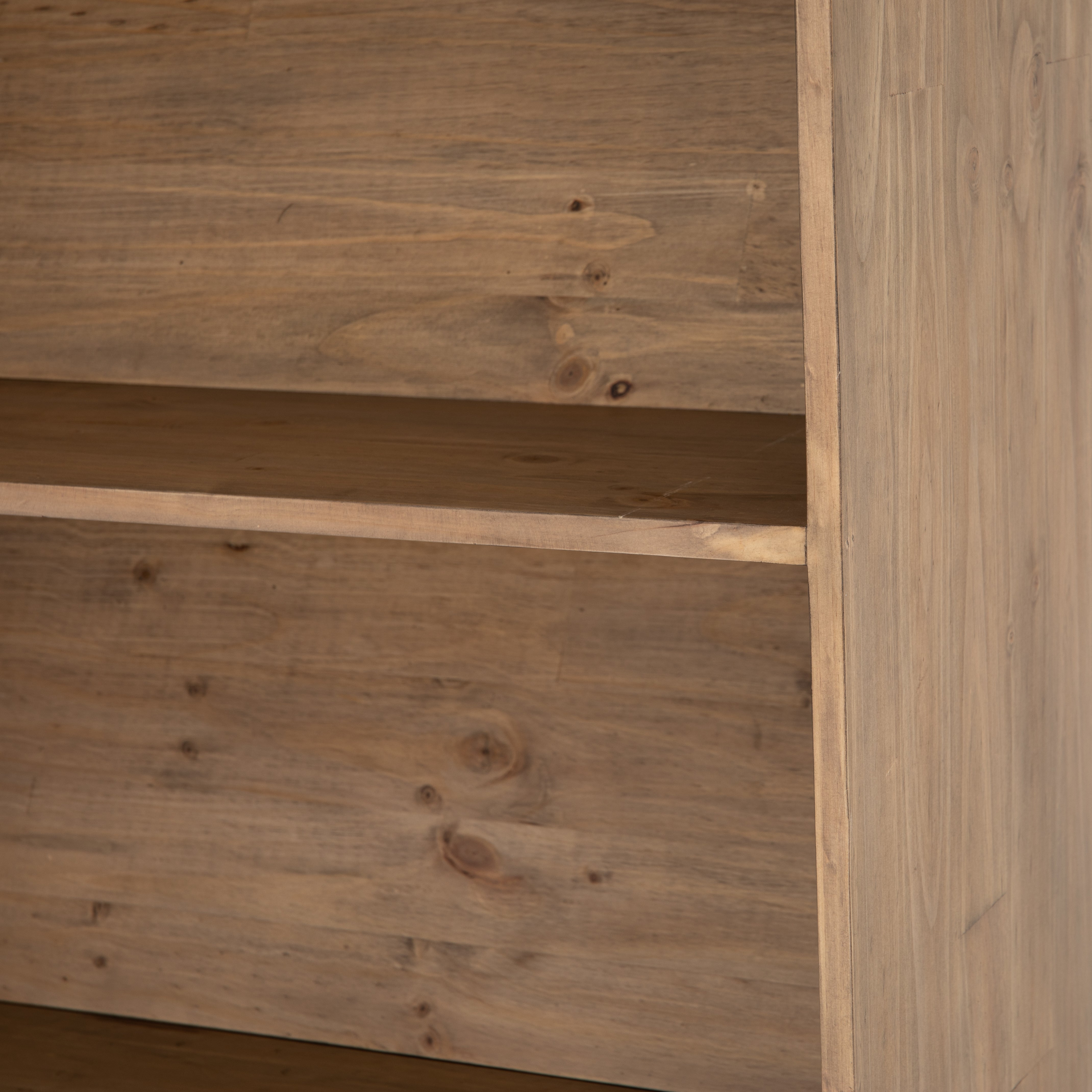 Five roomy shelves are ready to store favorite books and treasures, with smoked solid pine suited for any space. Removable ledges slant at an angle on each shelf, for even-better display of art and coffee table-size books, plus an optional slide ladder (for decorative use only) to complete the look.  Overall Dimensions: 35.50"w x 17.50"d x 98"h Colors: Smoked Pine, Black Iron Materials: Solid Pine, Iron
