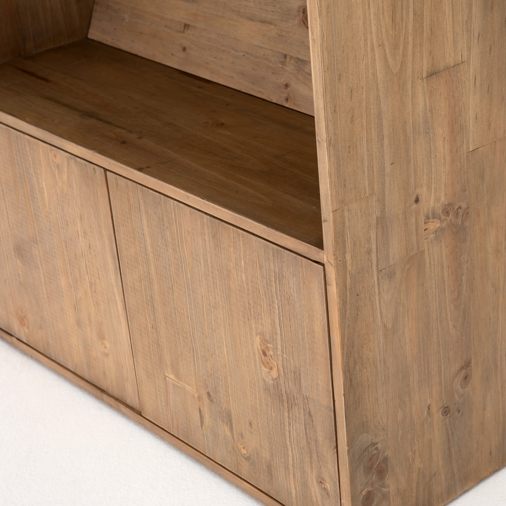 Five roomy shelves are ready to store favorite books and treasures, with smoked solid pine suited for any space. Removable ledges slant at an angle on each shelf, for even-better display of art and coffee table-size books, plus an optional slide ladder (for decorative use only) to complete the look.  Overall Dimensions: 35.50"w x 17.50"d x 98"h Colors: Smoked Pine, Black Iron Materials: Solid Pine, Iron