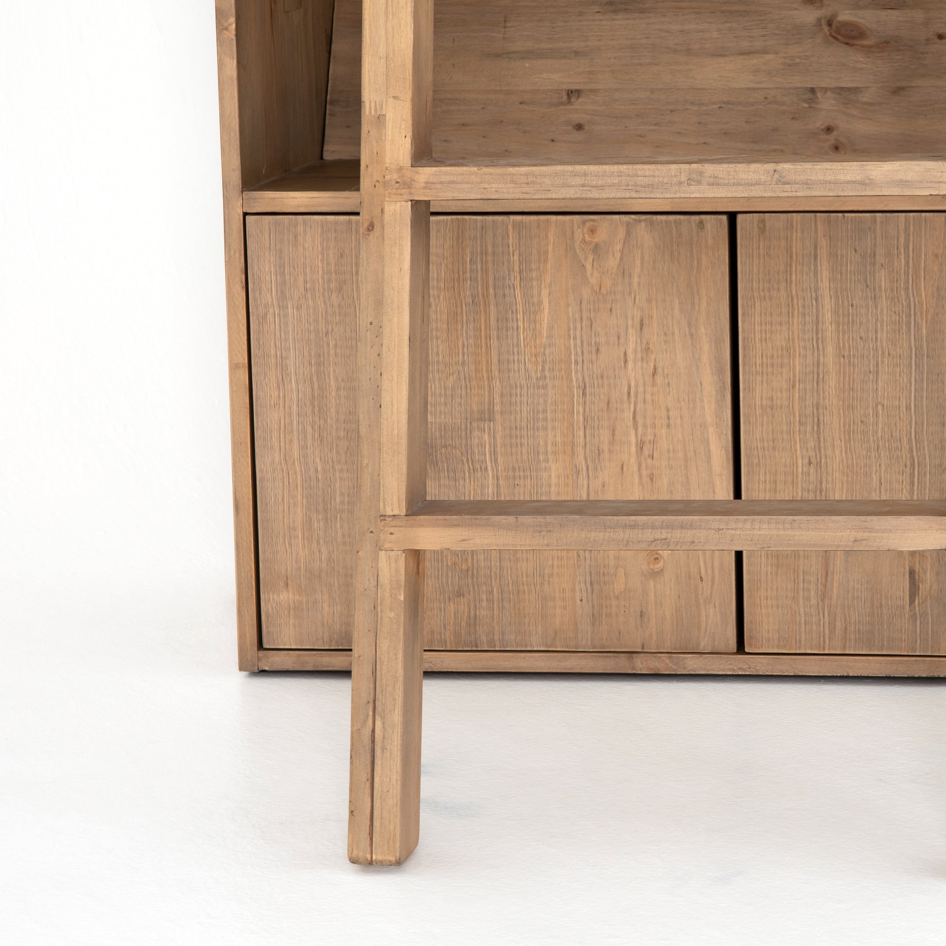Five roomy shelves are ready to store favorite books and treasures, with smoked solid pine suited for any space. Removable ledges slant at an angle on each shelf, for even-better display of art and coffee table-size books, plus an optional slide ladder (for decorative use only) to complete the look.  Overall Dimensions: 35.50"w x 17.50"d x 98"h Colors: Smoked Pine, Black Iron Materials: Solid Pine, Iron